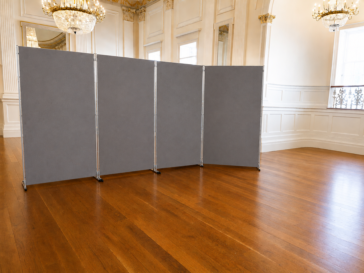 Four grey double-sided display boards joined into a run, shown in a room for scale